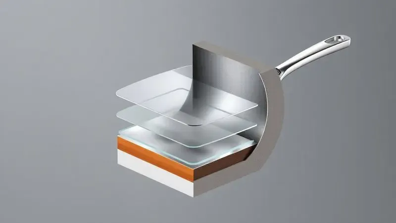 Renderização 3D das camadas internas de uma panela de titânio mostrando a resistência e a tecnologia do revestimento.