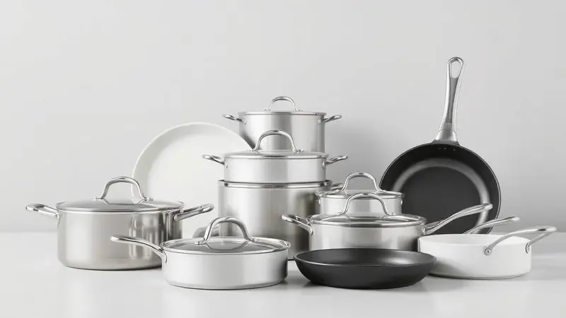 Renderização artística de diferentes tipos de panelas como inox e cerâmica para ilustrar cuidados com materiais.