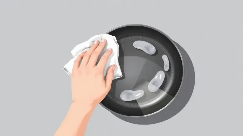 Ilustração de cuidados com a panela de titânio usando métodos de limpeza suaves para garantir a longevidade do utensílio.