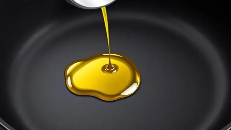 Ilustração digital do processo de cura de uma panela de ferro com óleo de forma artística.