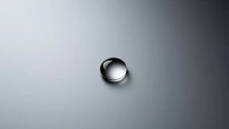 Ilustração 3D detalhada mostrando a textura de um revestimento antiaderente de alta qualidade com efeito hidrofóbico.